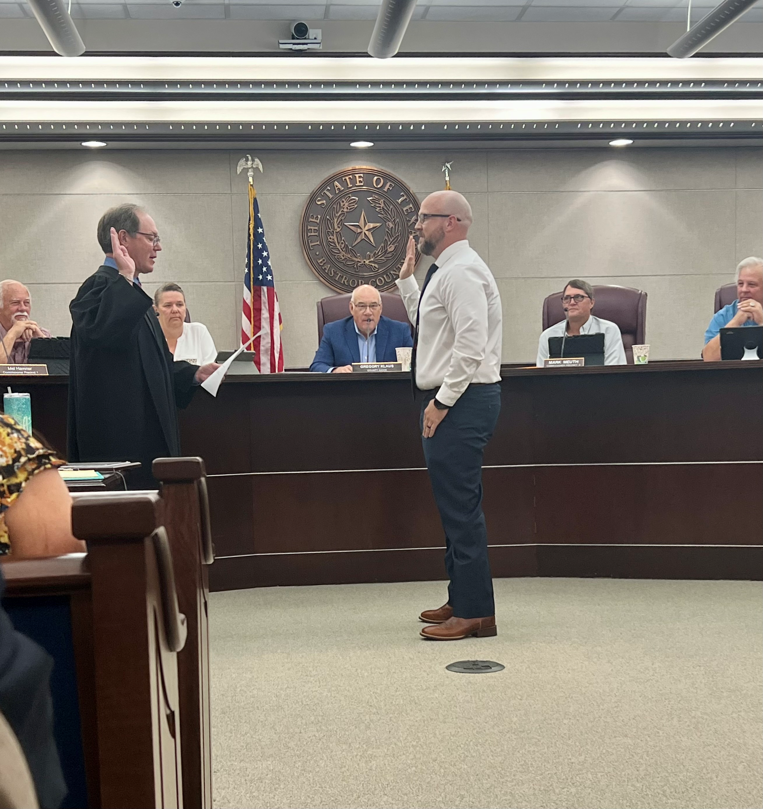 Zachary Carter being sworn in at Bastrop County courthouse